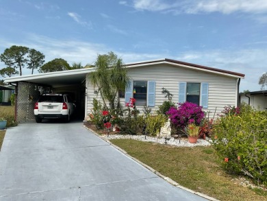 TIRED OF SNOW,ICE AND COLD, TRADE IT IN FOR SUN,WARM AND WHITE on Pine Lakes Country Club in Florida - for sale on GolfHomes.com, golf home, golf lot