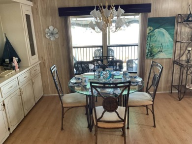TIRED OF SNOW,ICE AND COLD, TRADE IT IN FOR SUN,WARM AND WHITE on Pine Lakes Country Club in Florida - for sale on GolfHomes.com, golf home, golf lot