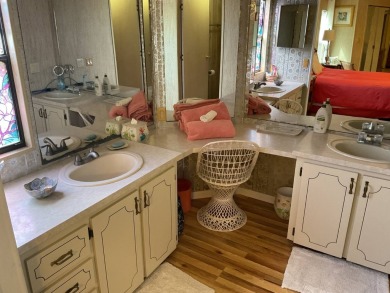 TIRED OF SNOW,ICE AND COLD, TRADE IT IN FOR SUN,WARM AND WHITE on Pine Lakes Country Club in Florida - for sale on GolfHomes.com, golf home, golf lot