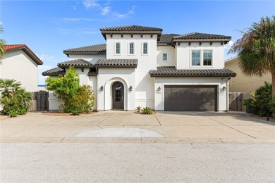 Nestled among palms on Island Moorings' coveted *Shady Side,* on Palmilla Beach Golf Club in Texas - for sale on GolfHomes.com, golf home, golf lot