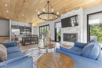 This newly constructed 2,300+ sqft cabin blends sleek modern on Sevierville Golf Club in Tennessee - for sale on GolfHomes.com, golf home, golf lot