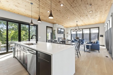 This newly constructed 2,300+ sqft cabin blends sleek modern on Sevierville Golf Club in Tennessee - for sale on GolfHomes.com, golf home, golf lot