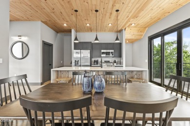 This newly constructed 2,300+ sqft cabin blends sleek modern on Sevierville Golf Club in Tennessee - for sale on GolfHomes.com, golf home, golf lot