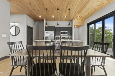 This newly constructed 2,300+ sqft cabin blends sleek modern on Sevierville Golf Club in Tennessee - for sale on GolfHomes.com, golf home, golf lot