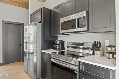 This newly constructed 2,300+ sqft cabin blends sleek modern on Sevierville Golf Club in Tennessee - for sale on GolfHomes.com, golf home, golf lot