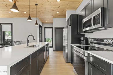 This newly constructed 2,300+ sqft cabin blends sleek modern on Sevierville Golf Club in Tennessee - for sale on GolfHomes.com, golf home, golf lot
