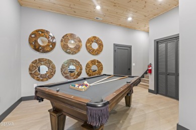 This newly constructed 2,300+ sqft cabin blends sleek modern on Sevierville Golf Club in Tennessee - for sale on GolfHomes.com, golf home, golf lot