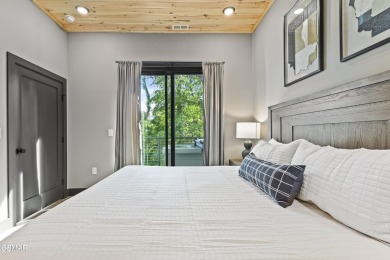 This newly constructed 2,300+ sqft cabin blends sleek modern on Sevierville Golf Club in Tennessee - for sale on GolfHomes.com, golf home, golf lot