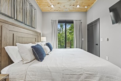This newly constructed 2,300+ sqft cabin blends sleek modern on Sevierville Golf Club in Tennessee - for sale on GolfHomes.com, golf home, golf lot