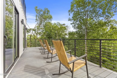 This newly constructed 2,300+ sqft cabin blends sleek modern on Sevierville Golf Club in Tennessee - for sale on GolfHomes.com, golf home, golf lot