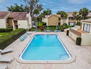 Beautifully Renovated 2-Bedroom Condo in Carrollwood's Pine Lake on Emerald Greens Golf Resort and Country Club in Florida - for sale on GolfHomes.com, golf home, golf lot