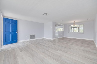 One or more photo(s) has been virtually staged. One or more on Gulf Harbors Golf Course in Florida - for sale on GolfHomes.com, golf home, golf lot