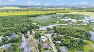 Are you looking for a completely remodeled lakefront home on 5 on Sun Air Golf Course in Florida - for sale on GolfHomes.com, golf home, golf lot