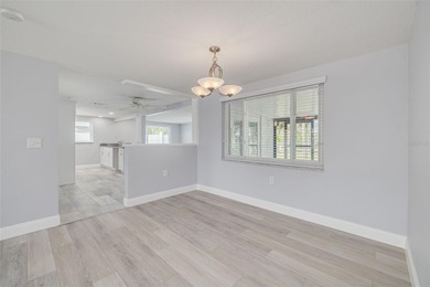 One or more photo(s) has been virtually staged. One or more on Gulf Harbors Golf Course in Florida - for sale on GolfHomes.com, golf home, golf lot