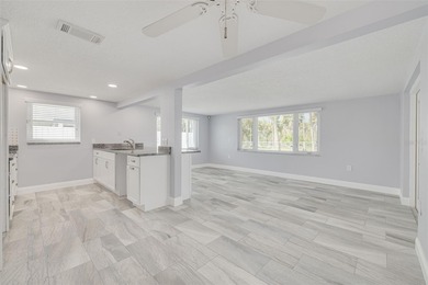 One or more photo(s) has been virtually staged. One or more on Gulf Harbors Golf Course in Florida - for sale on GolfHomes.com, golf home, golf lot