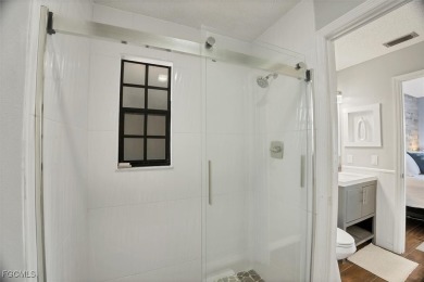 Discover effortless coastal charm in this rare end-unit villa on Rotonda Golf and Country Club The Palms Course in Florida - for sale on GolfHomes.com, golf home, golf lot