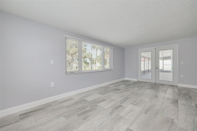 One or more photo(s) has been virtually staged. One or more on Gulf Harbors Golf Course in Florida - for sale on GolfHomes.com, golf home, golf lot