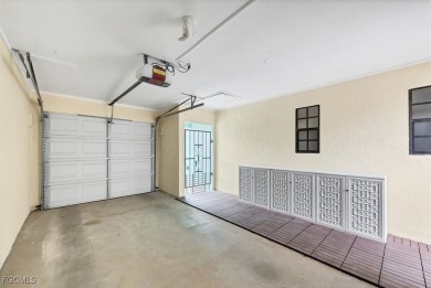 Discover effortless coastal charm in this rare end-unit villa on Rotonda Golf and Country Club The Palms Course in Florida - for sale on GolfHomes.com, golf home, golf lot