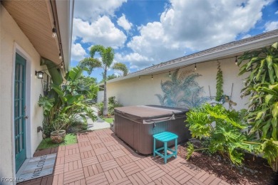 Discover effortless coastal charm in this rare end-unit villa on Rotonda Golf and Country Club The Palms Course in Florida - for sale on GolfHomes.com, golf home, golf lot