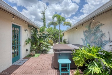 Discover effortless coastal charm in this rare end-unit villa on Rotonda Golf and Country Club The Palms Course in Florida - for sale on GolfHomes.com, golf home, golf lot