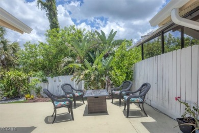 Discover effortless coastal charm in this rare end-unit villa on Rotonda Golf and Country Club The Palms Course in Florida - for sale on GolfHomes.com, golf home, golf lot