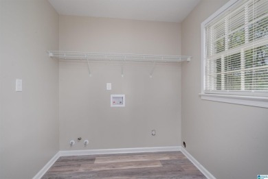 BRAND NEW ROOF! Step into this beautifully renovated 4-bedroom on Woodland Forrest Country Club in Alabama - for sale on GolfHomes.com, golf home, golf lot