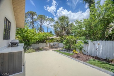 Discover effortless coastal charm in this rare end-unit villa on Rotonda Golf and Country Club The Palms Course in Florida - for sale on GolfHomes.com, golf home, golf lot
