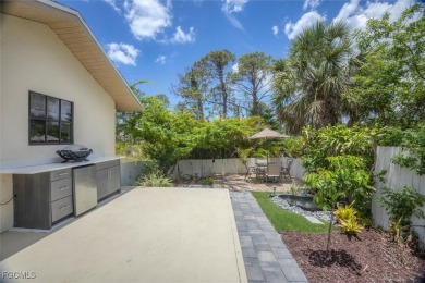 Discover effortless coastal charm in this rare end-unit villa on Rotonda Golf and Country Club The Palms Course in Florida - for sale on GolfHomes.com, golf home, golf lot