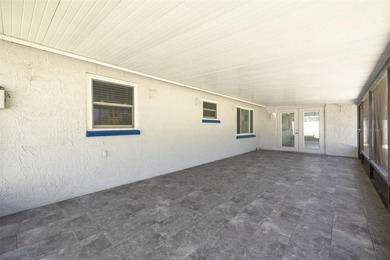 One or more photo(s) has been virtually staged. One or more on Gulf Harbors Golf Course in Florida - for sale on GolfHomes.com, golf home, golf lot