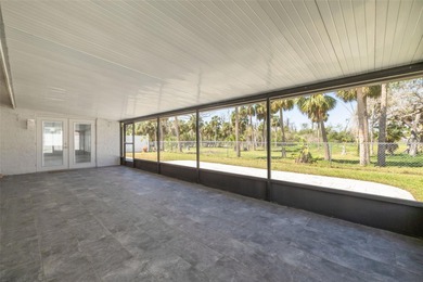 One or more photo(s) has been virtually staged. One or more on Gulf Harbors Golf Course in Florida - for sale on GolfHomes.com, golf home, golf lot