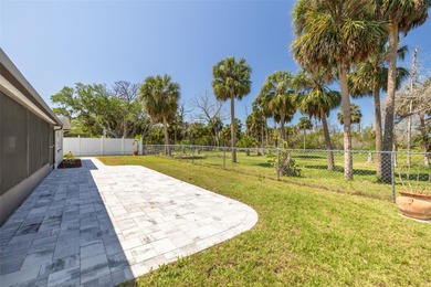 One or more photo(s) has been virtually staged. One or more on Gulf Harbors Golf Course in Florida - for sale on GolfHomes.com, golf home, golf lot