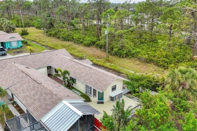 Discover effortless coastal charm in this rare end-unit villa on Rotonda Golf and Country Club The Palms Course in Florida - for sale on GolfHomes.com, golf home, golf lot