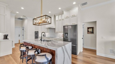 Are you looking for a completely remodeled lakefront home on 5 on Sun Air Golf Course in Florida - for sale on GolfHomes.com, golf home, golf lot