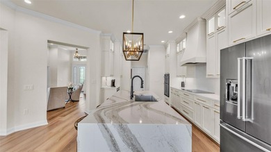 Are you looking for a completely remodeled lakefront home on 5 on Sun Air Golf Course in Florida - for sale on GolfHomes.com, golf home, golf lot