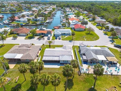 One or more photo(s) has been virtually staged. One or more on Gulf Harbors Golf Course in Florida - for sale on GolfHomes.com, golf home, golf lot
