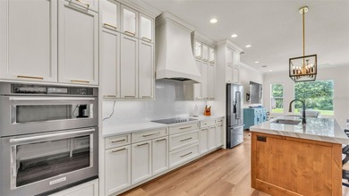 Are you looking for a completely remodeled lakefront home on 5 on Sun Air Golf Course in Florida - for sale on GolfHomes.com, golf home, golf lot