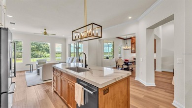 Are you looking for a completely remodeled lakefront home on 5 on Sun Air Golf Course in Florida - for sale on GolfHomes.com, golf home, golf lot