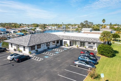 One or more photo(s) has been virtually staged. One or more on Gulf Harbors Golf Course in Florida - for sale on GolfHomes.com, golf home, golf lot