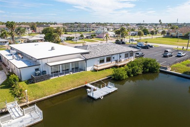 One or more photo(s) has been virtually staged. One or more on Gulf Harbors Golf Course in Florida - for sale on GolfHomes.com, golf home, golf lot