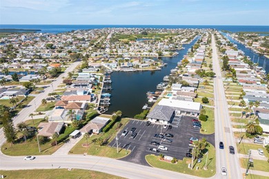 One or more photo(s) has been virtually staged. One or more on Gulf Harbors Golf Course in Florida - for sale on GolfHomes.com, golf home, golf lot