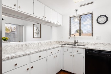 Charming and cozy, this end-unit home is a rare find in the on Bloomington Country Club in Utah - for sale on GolfHomes.com, golf home, golf lot