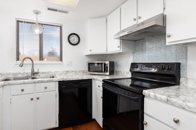 Charming and cozy, this end-unit home is a rare find in the on Bloomington Country Club in Utah - for sale on GolfHomes.com, golf home, golf lot