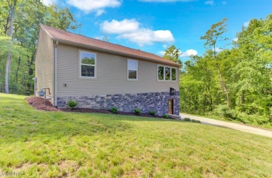 Welcome to your dream home at Lake Mohawk! This stunning 3 on Lake Mohawk Golf Club in Ohio - for sale on GolfHomes.com, golf home, golf lot