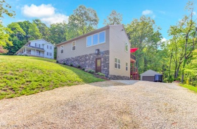 Welcome to your dream home at Lake Mohawk! This stunning 3 on Lake Mohawk Golf Club in Ohio - for sale on GolfHomes.com, golf home, golf lot