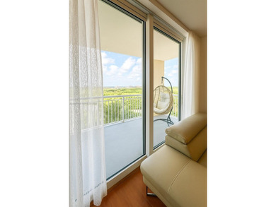 Spacious and inviting 1-bedroom, 1.5-bath residence at DUO on The Diplomat Golf Resort and Spa in Florida - for sale on GolfHomes.com, golf home, golf lot