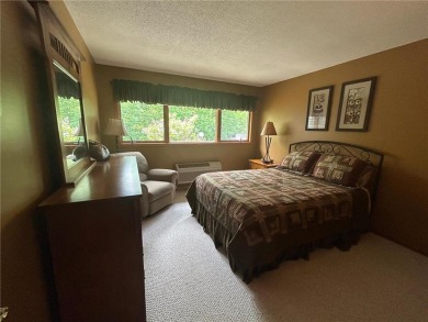 One level living at its best in Hill City, a bedroom community on Quadna Mountain Resort Golf Course in Minnesota - for sale on GolfHomes.com, golf home, golf lot