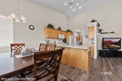 This spacious townhome is gorgeous and ideally positioned in on Wolf Creek At Paradise Canyon in Nevada - for sale on GolfHomes.com, golf home, golf lot