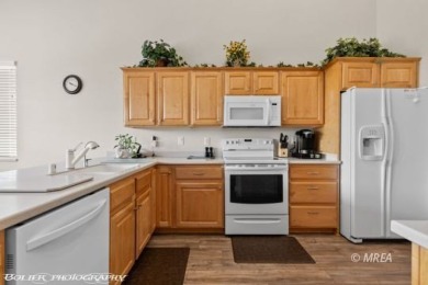 This spacious townhome is gorgeous and ideally positioned in on Wolf Creek At Paradise Canyon in Nevada - for sale on GolfHomes.com, golf home, golf lot