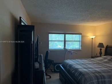 Welcome to this beautifully maintained 2-bedroom, 2-bathroom on Fontainebleau Golf Course in Florida - for sale on GolfHomes.com, golf home, golf lot