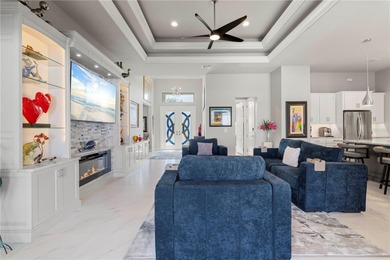 SHOWCASE HOME W/A WATER VIEW IN PGI! Check out this exceptional on Saint Andrews South Golf Club in Florida - for sale on GolfHomes.com, golf home, golf lot